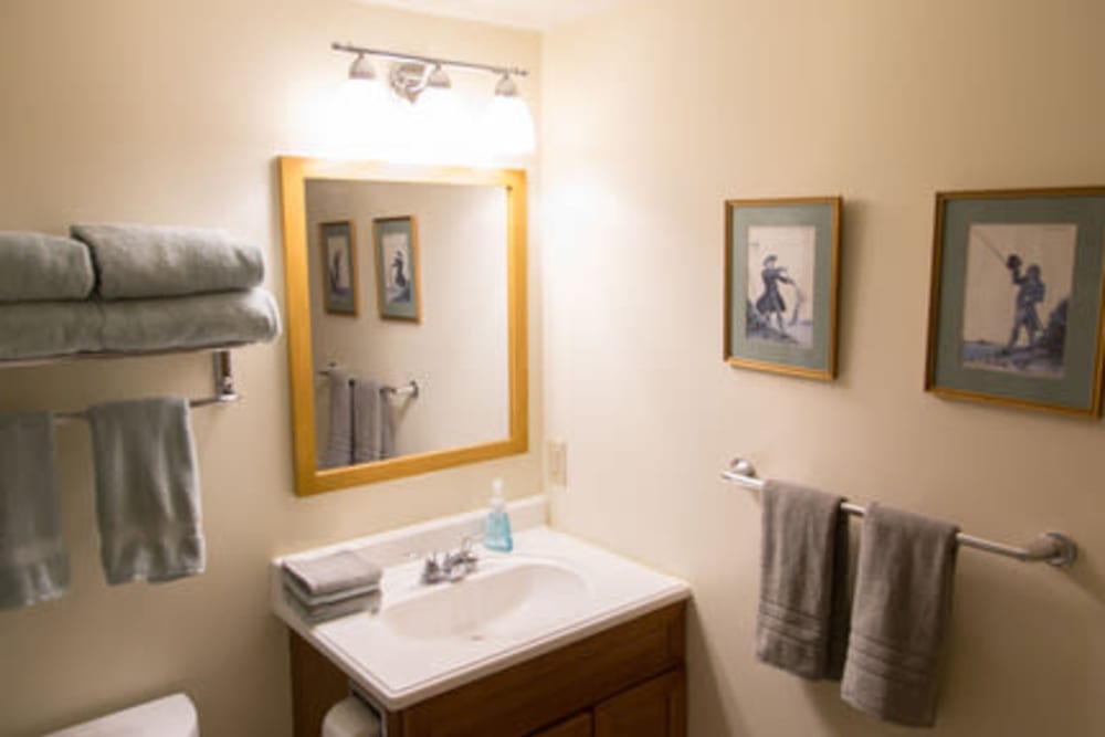 Bright bathroom at London Court Apartments in Merrimack, New Hampshire