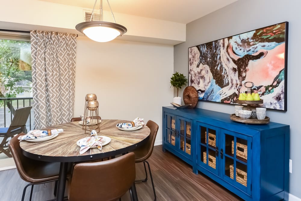 Dining area with vinyl plank flooring at Chesterfield Apartment Homes in Levittown, Pennsylvania