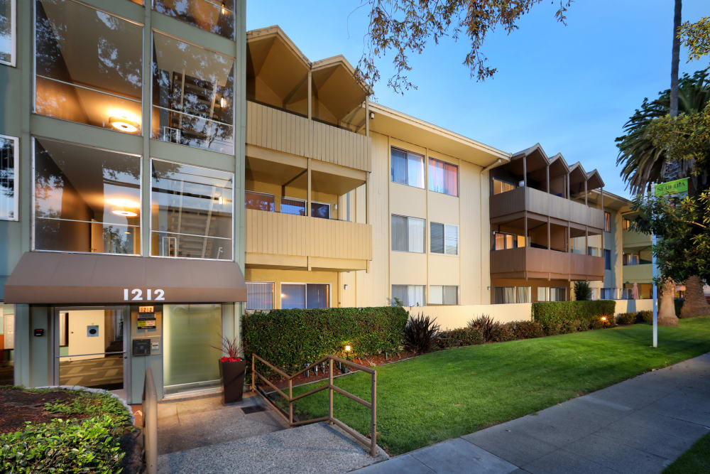 Exterior view at dusk of our classic, mid-century community at Sofi Redwood Park in Redwood City, California