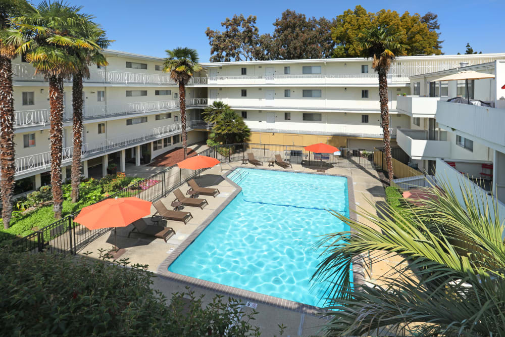 View of the swimming pool area from an upper floor at Sofi Redwood Park in Redwood City, California
