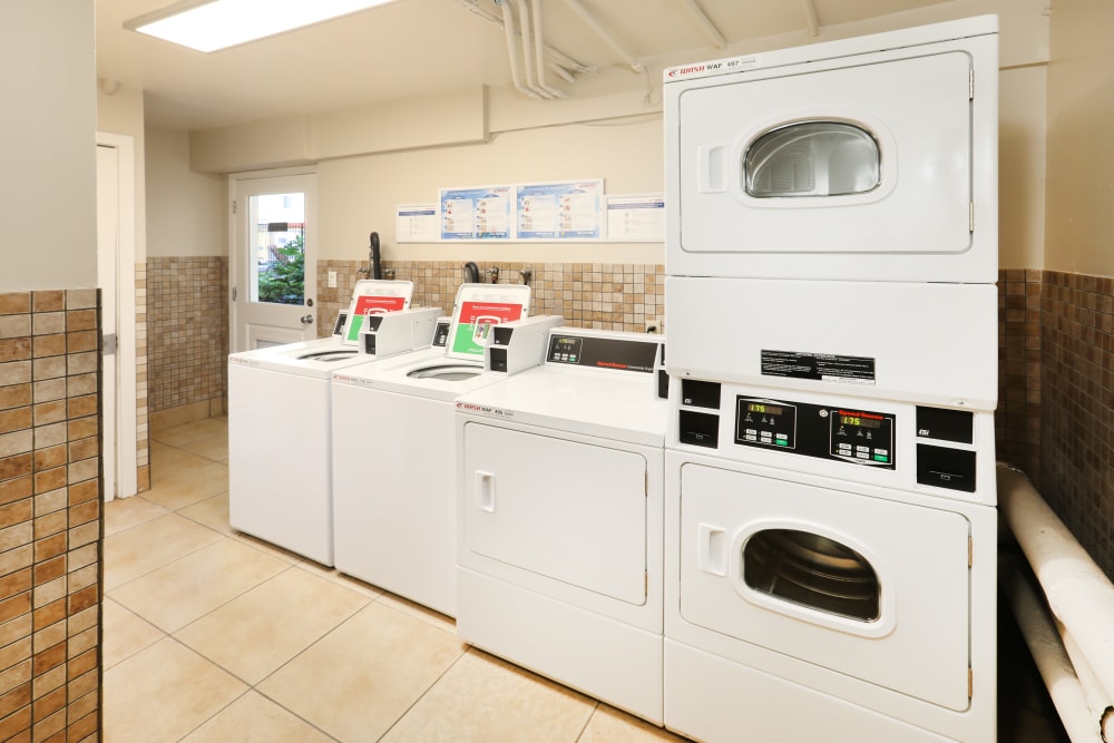 Clean and tidy community laundry room at Sofi Redwood Park in Redwood City, California