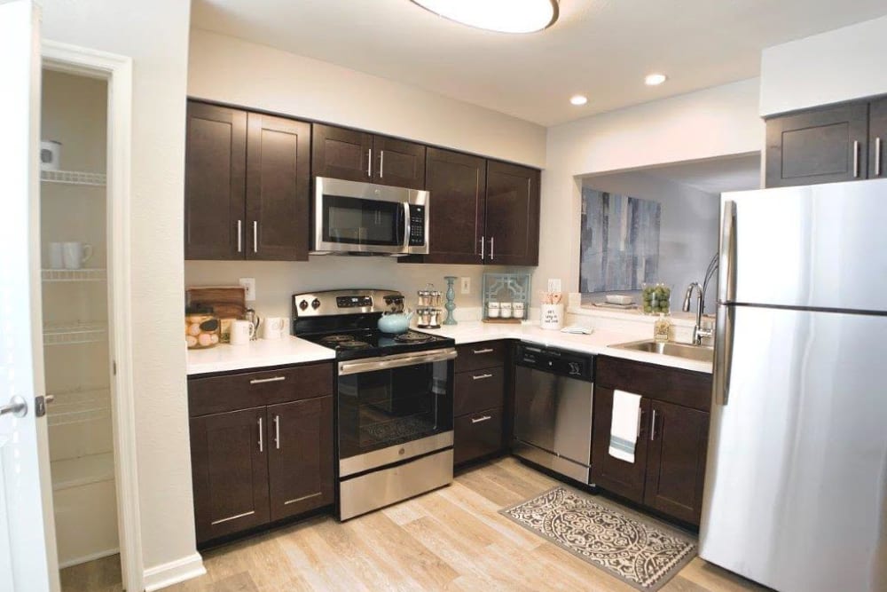 A kitchen with stainless-steel appliances at Villas at Greenview West in Great Mills, Maryland