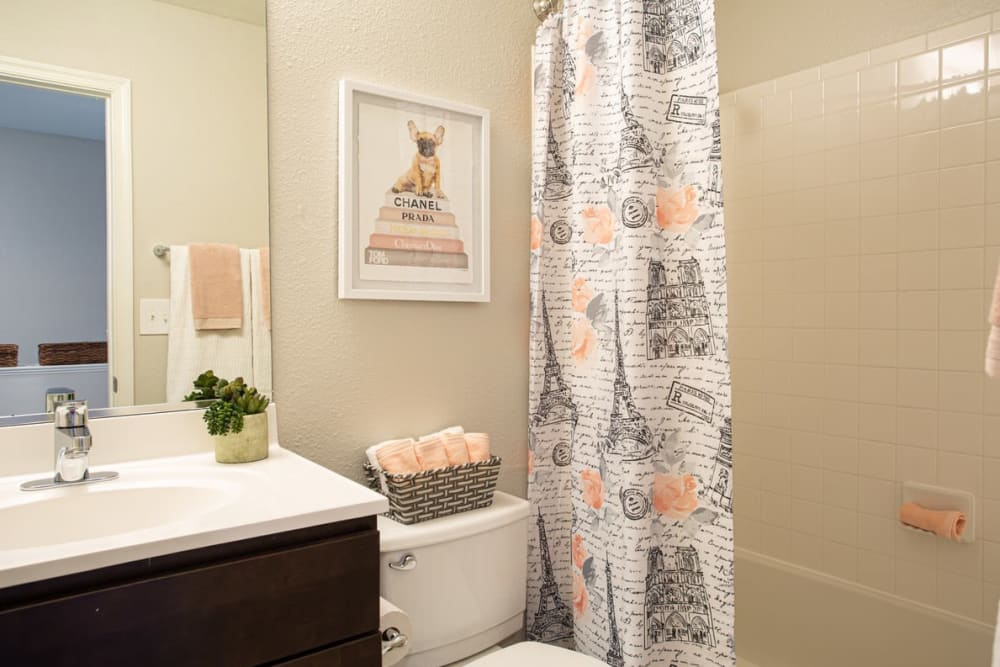 A bathroom with an oval tub at Villas at Greenview West in Great Mills, Maryland