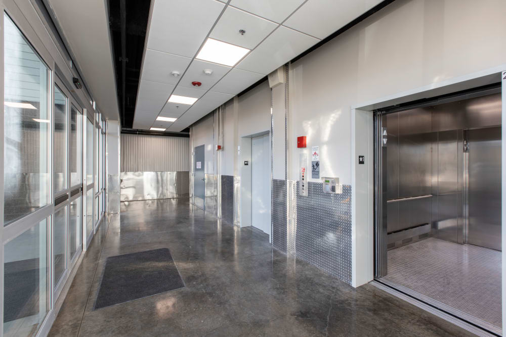 The wide hallways and elevators at Ballinger Heated Storage in Shoreline, Washington