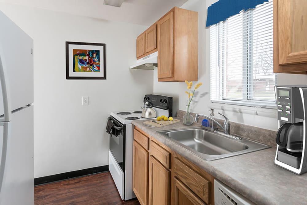 Well-equipped kitchen at Brockport Crossings Apartments & Townhomes in Brockport, New York