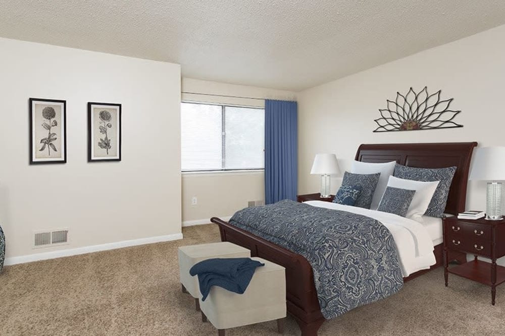 Spacious master bedroom at Crossroads Apartments & Townhomes in Spencerport, New York