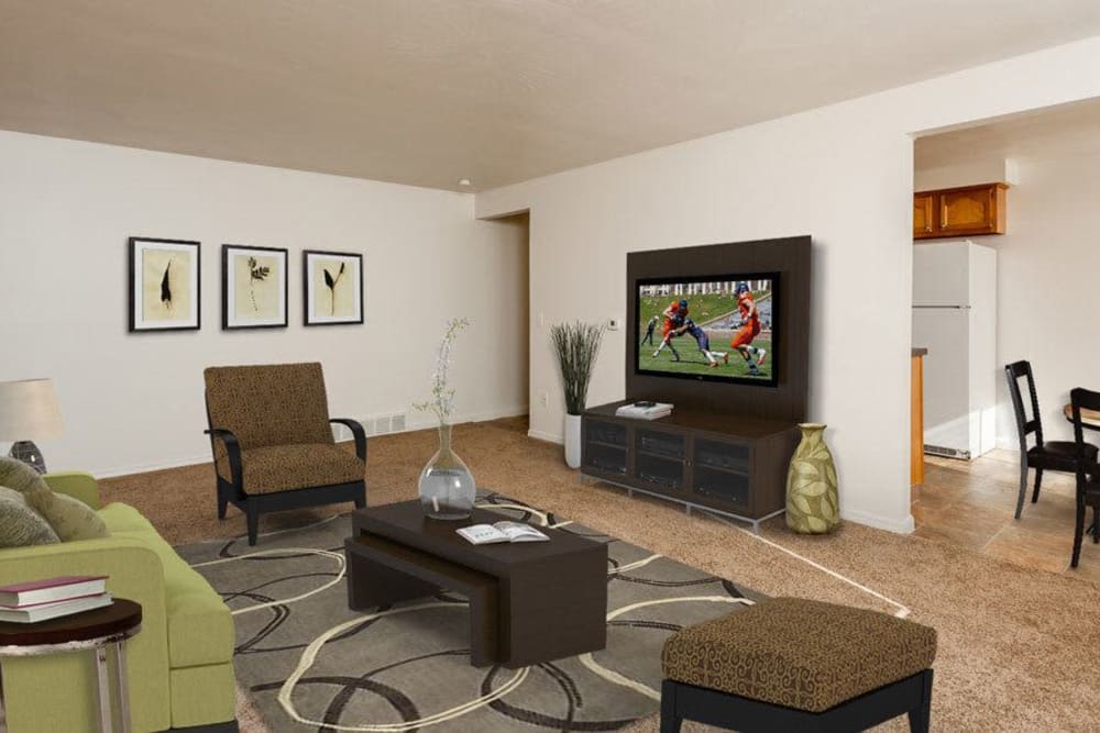 Spacious living room at East Ridge Manor Apartments in Rochester, New York