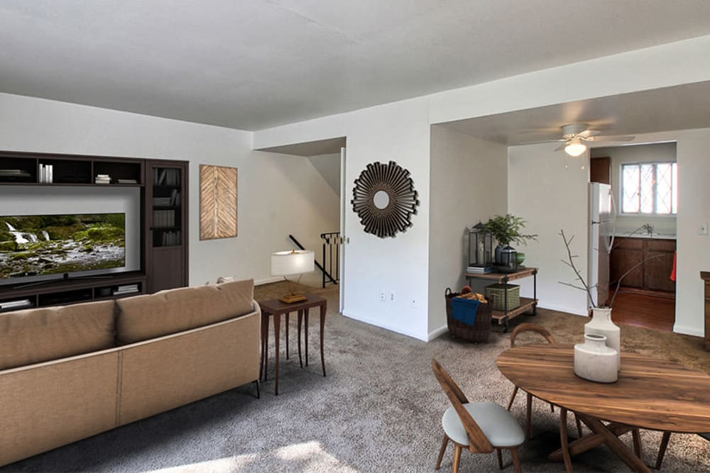 Cozy living room at Elmwood Terrace Apartments & Townhomes in Rochester, New York