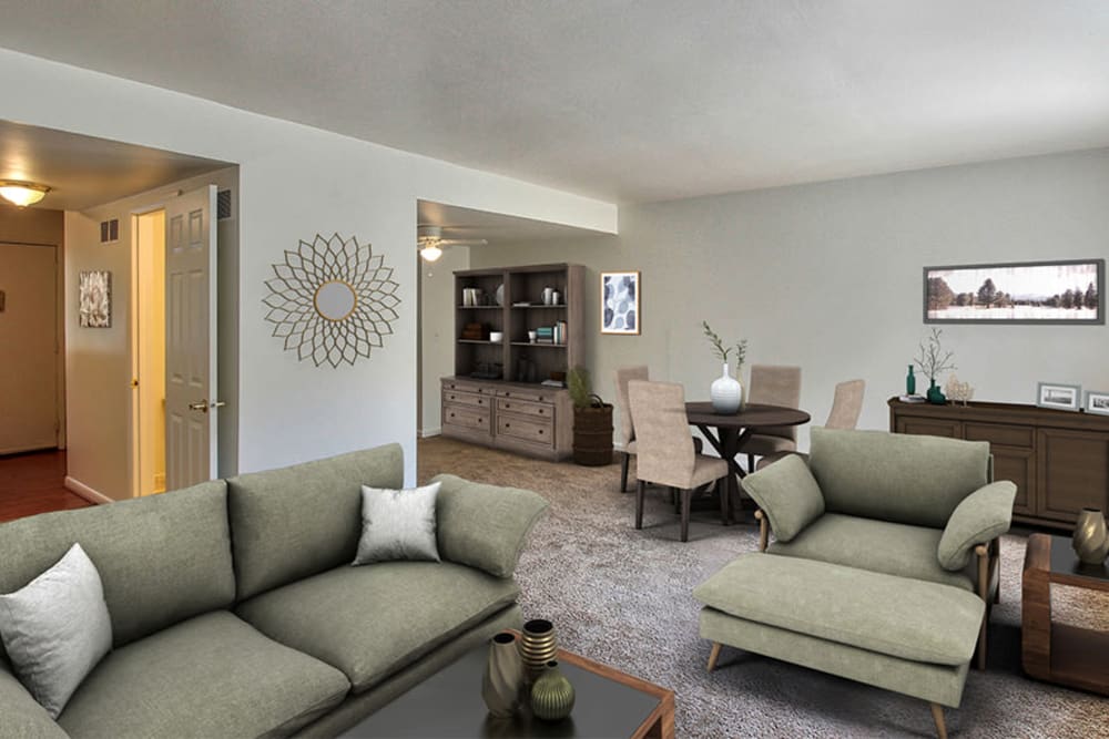 Beautiful living room at Elmwood Terrace Apartments & Townhomes in Rochester, New York
