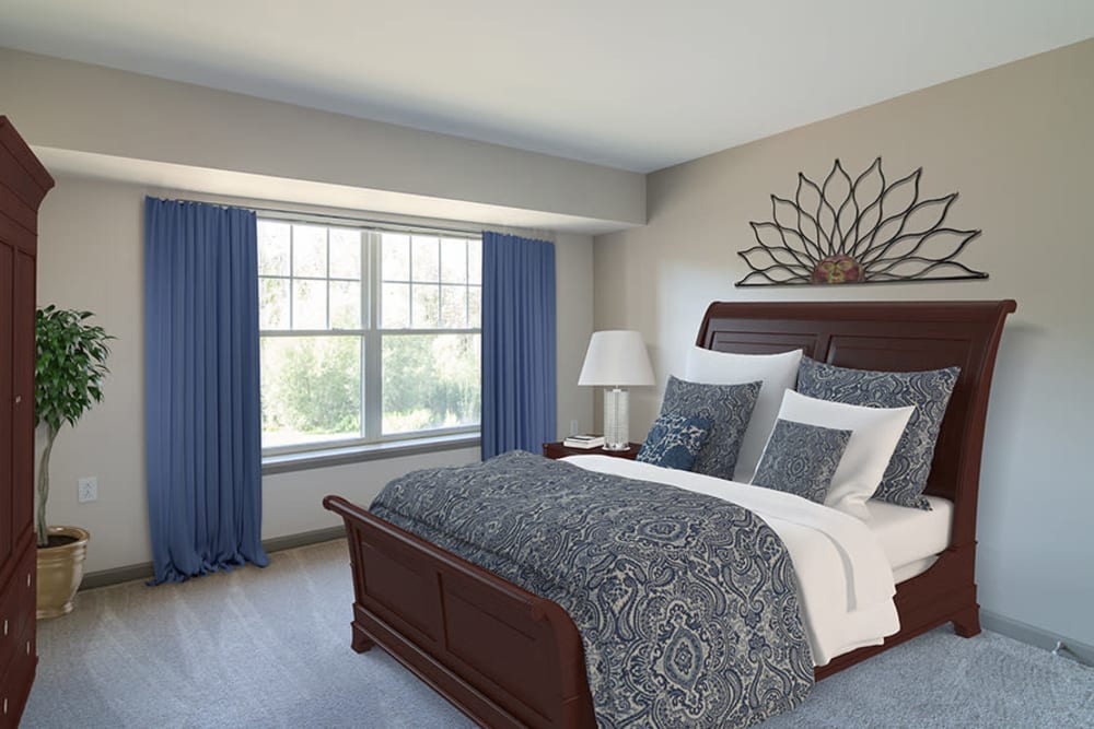 Large master bedroom at Greenwood Cove Apartments in Rochester, New York