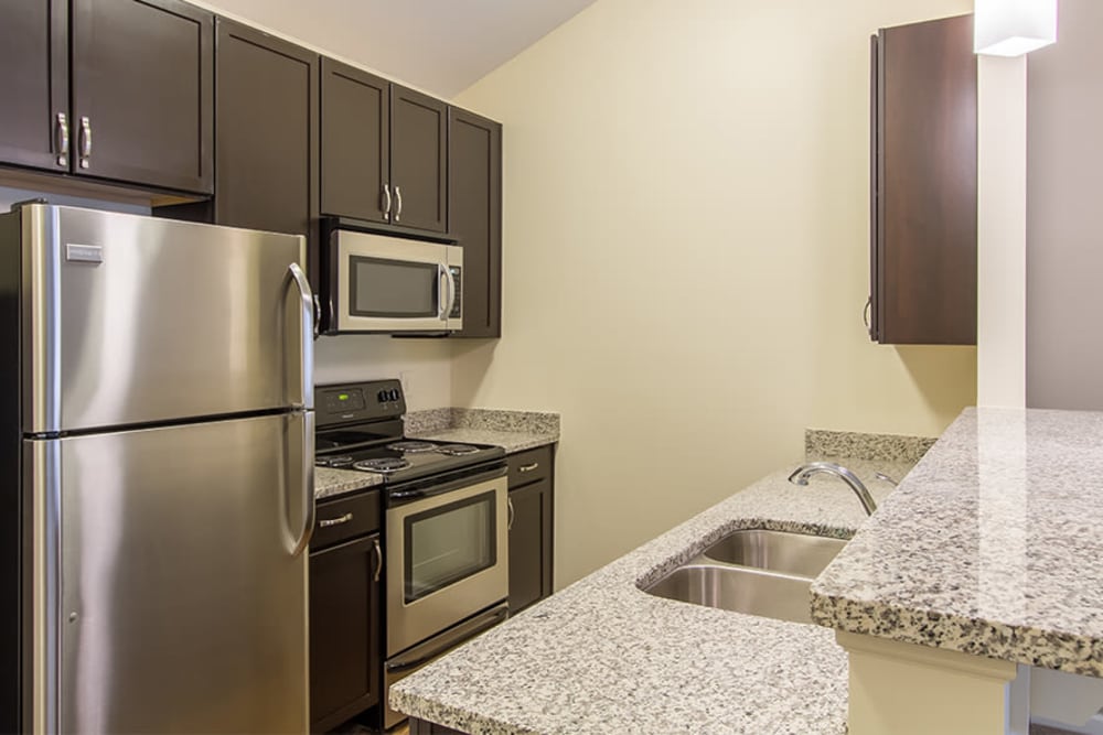 Well-equipped kitchen at Ethan Pointe Apartments home in Rochester, New York