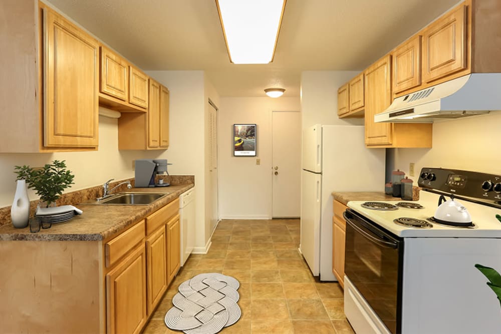 Well-equipped kitchen at Henrietta Highlands in Henrietta, New York