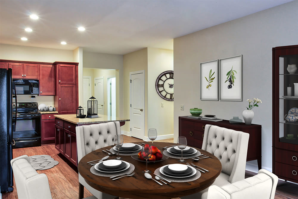 Dining area and kitchen in a model home at Gateway Landing on the Canal in Rochester, New York
