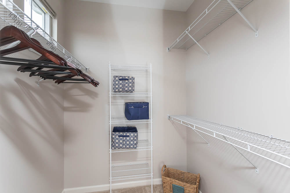 Walk in closet at North Ponds Apartments & Townhomes in Webster, New York.