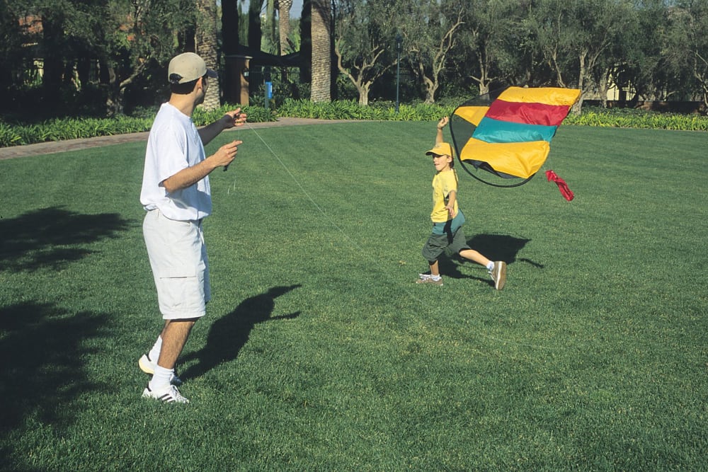 Residents flying a kite at Greendale Apartments in Mountain View, California