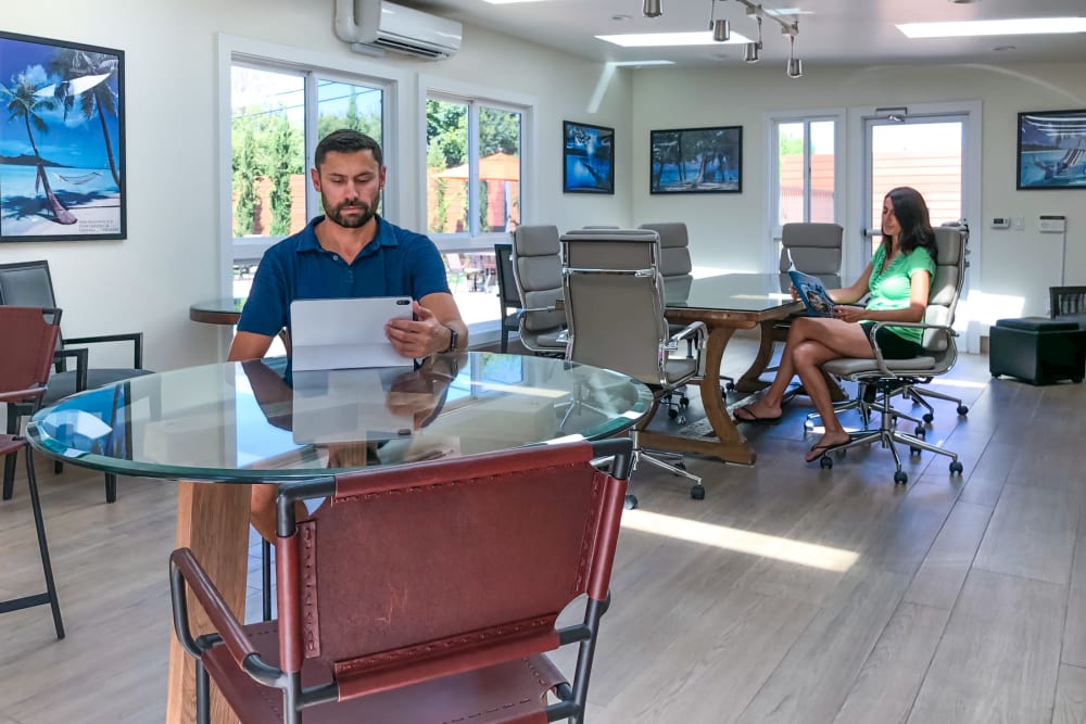 Residents working in the co-work space at Halford Gardens Apartments in Santa Clara, California