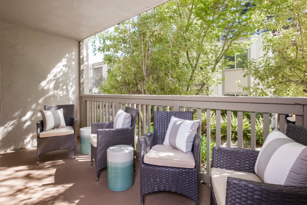 Patio chair on a private balcony at Spring Creek Apartments in Santa Clara, California