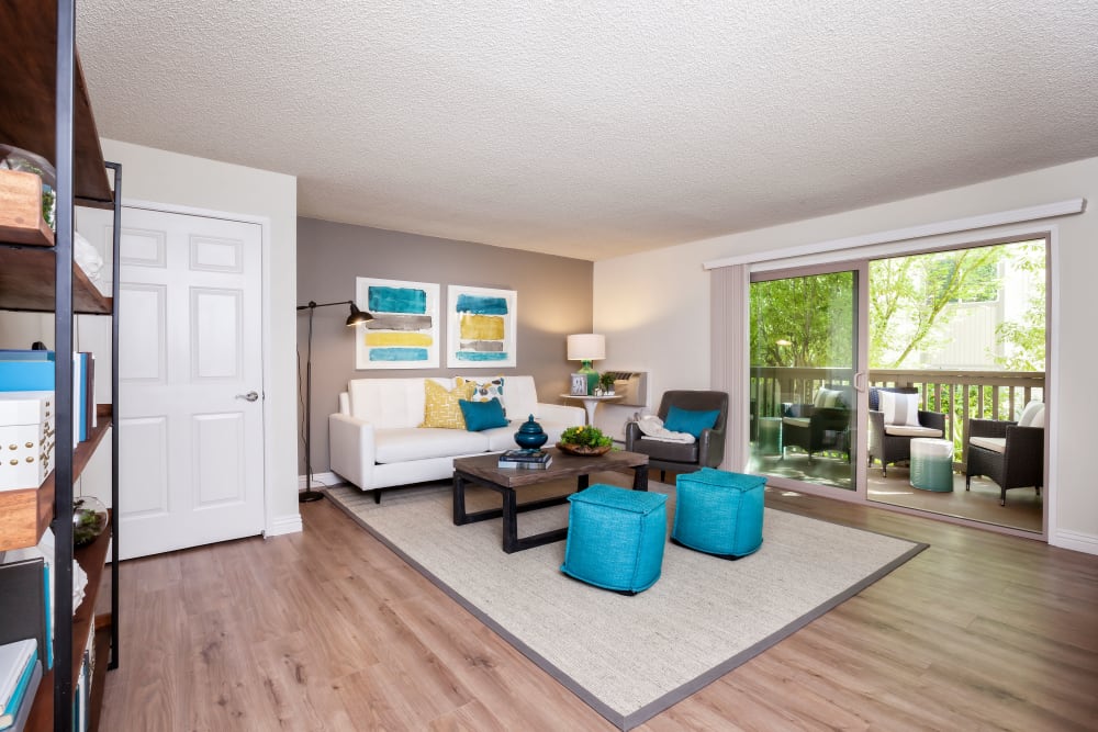 Spacious, bright living room at Spring Creek Apartments in Santa Clara, California