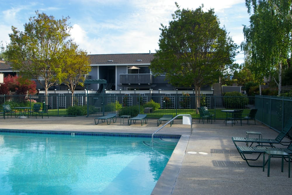 Pool and exterior of Village Green Apartments in Cupertino, California