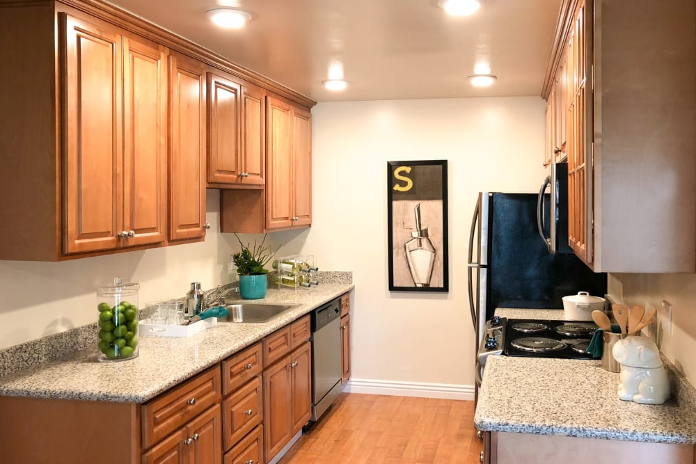 Fully equipped kitchen at Village Green Apartments in Cupertino, California