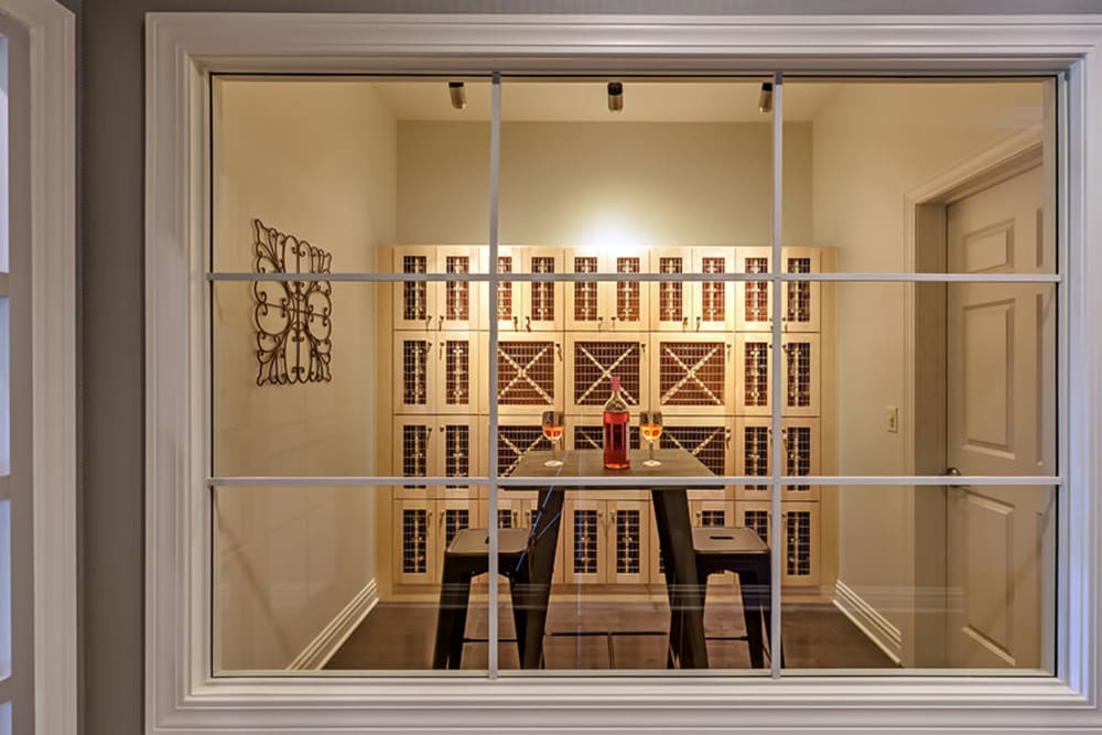 Demonstration kitchen and wine storage at Rochester Village Apartments at Park Place in Cranberry Township, Pennsylvania