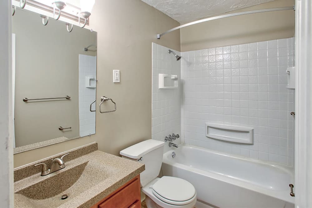 Bathroom with tub/shower combination at Solon Club Apartments in Oakwood Village, Ohio