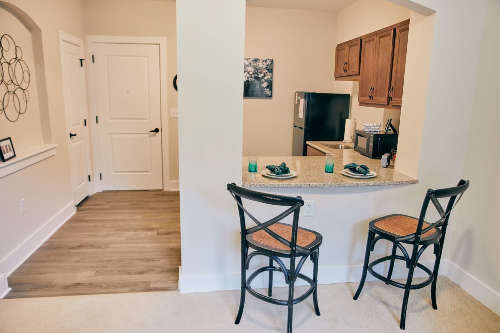 Sitting at the kitchen bar is available at Harmony at West Ashley in Charleston, South Carolina