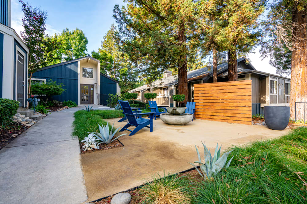 Peaceful fountain with comfortable seating nearby at Terra Martinez in Martinez, California