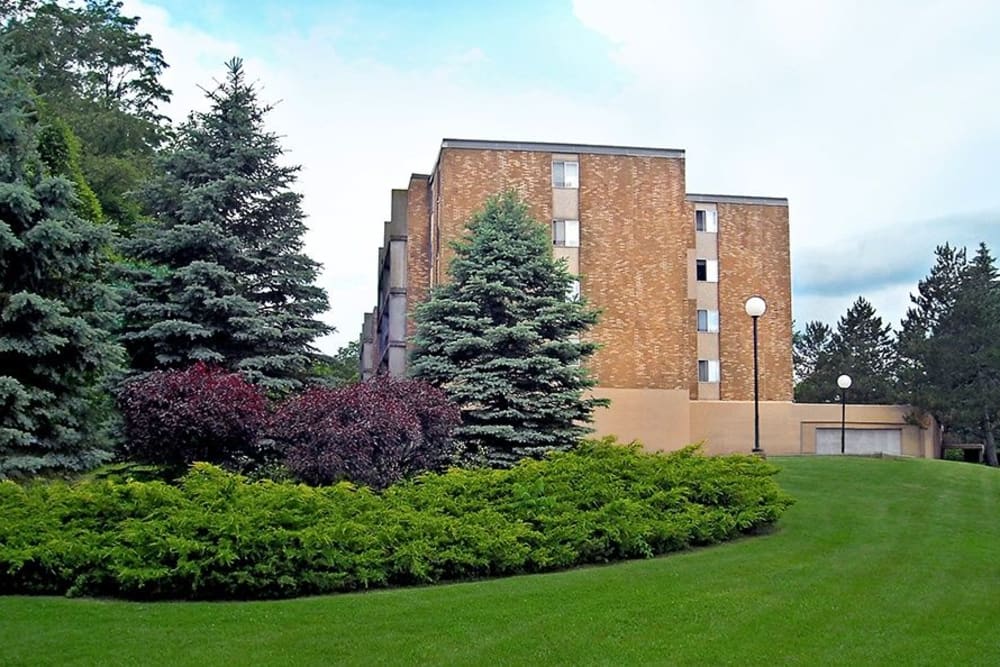 Landscaping and apartment building exterior at Park Guilderland Apartments in Guilderland Center, New York