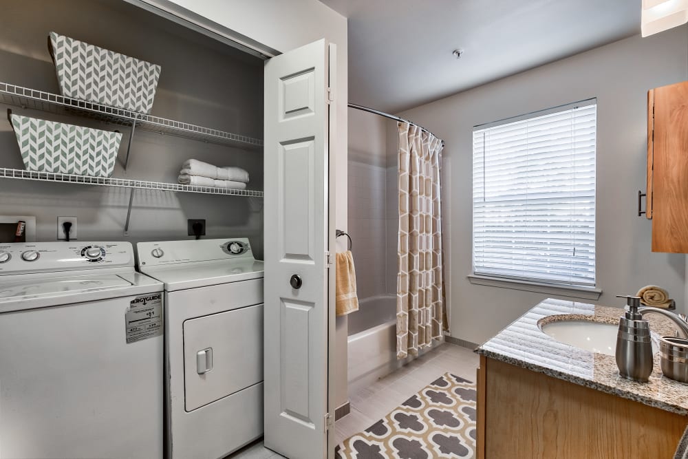 Oversized bathroom with washer & dryer at The Reserve at Ballenger Creek Apartments in Frederick , Maryland
