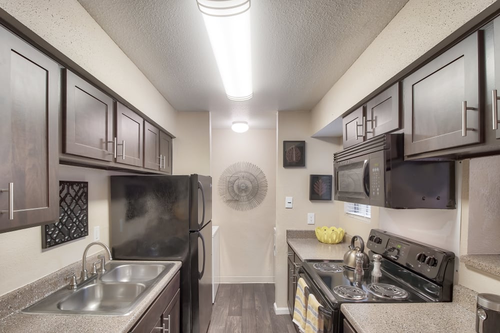 Kitchen at Promontory Point Apartments in Austin, Texas