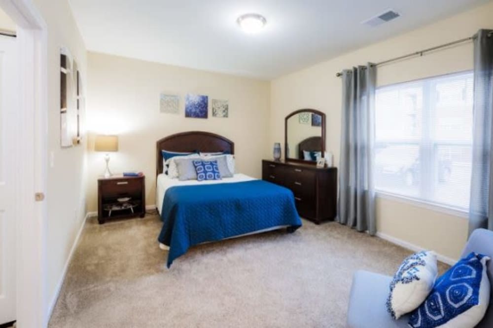 Bright master bedroom at Torrente Apartment Homes in Upper St Clair, Pennsylvania
