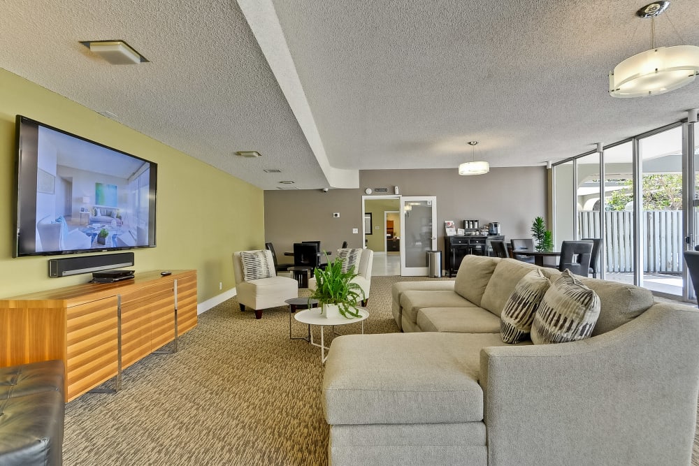 The clubhouse with tv and seating area at The Marc, Palo Alto in Palo Alto, California