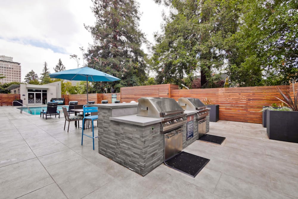 Barbecue area with gas grills at Mia in Palo Alto, California