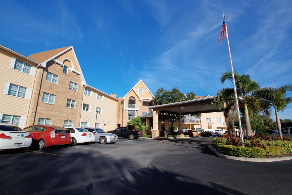 Cars parked in front of the entrance at Bayside Terrace in Pinellas Park, Florida