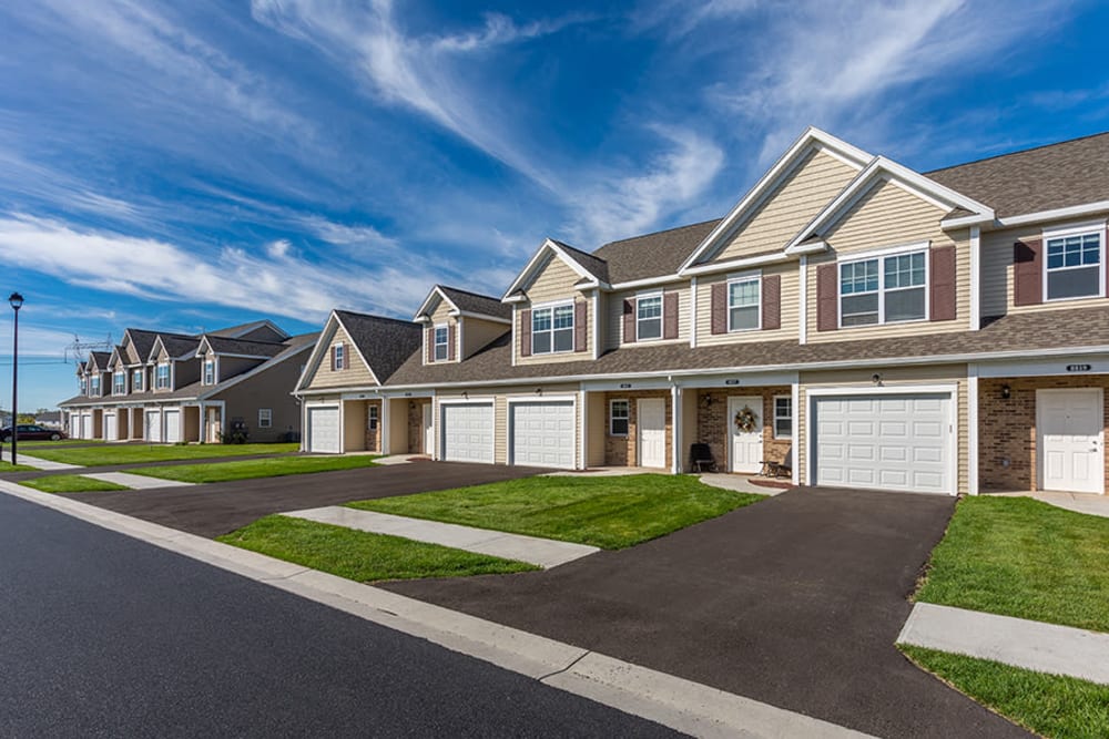 Townhomes with garages at Woodland Acres Townhomes in Liverpool, New York