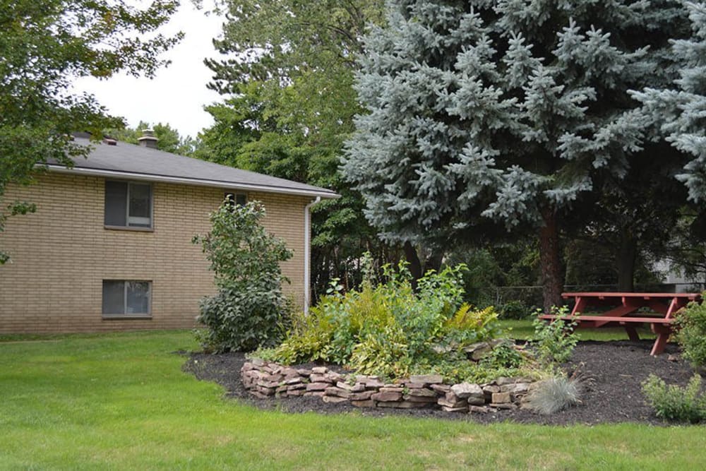 Tranquil courtyard at Long Pond Gardens Senior Apartments in Rochester, New York