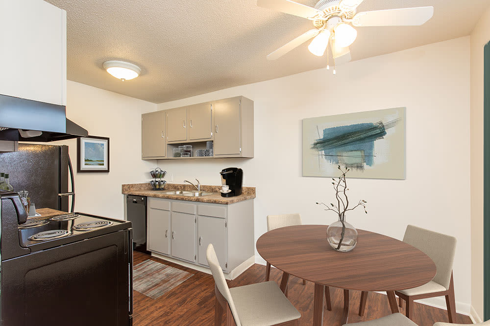 Eat-in kitchen at Penfield Village Apartments in Penfield, New York