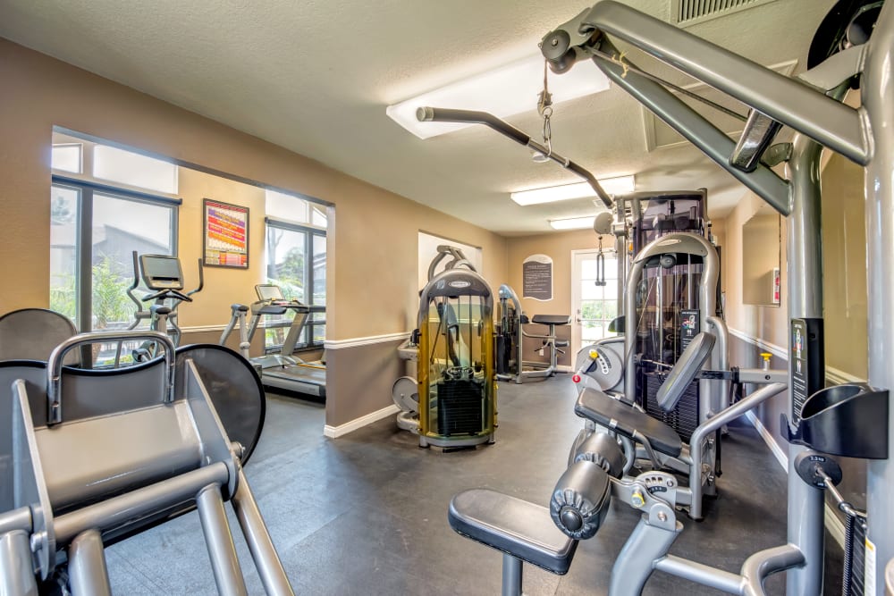 Fitness center with various cardio and weight training equipment and exercise machines at Sofi Laguna Hills in Laguna Hills, California