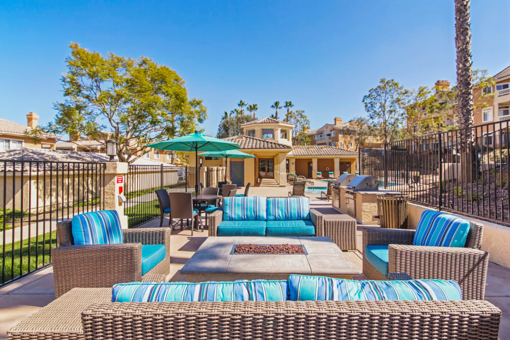 Well-furnished outdoor lounge near the fire pit at Sofi Canyon Hills in San Diego, California