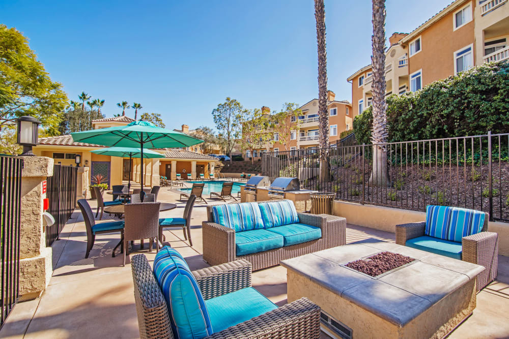 Fire pit with lounge seating at Sofi Canyon Hills in San Diego, California