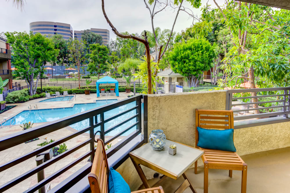 View of the swimming pool area from an upper floor's balcony at Sofi Irvine in Irvine, California