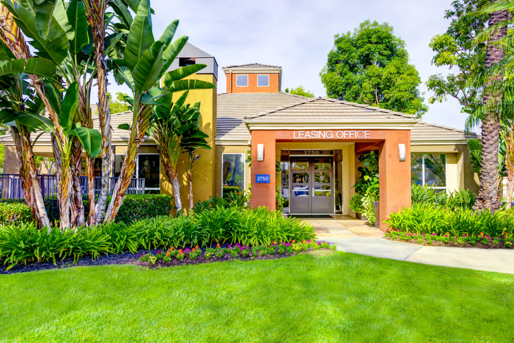 Exterior view of the leasing center and well-manicured landscaping at Sofi Irvine in Irvine, California