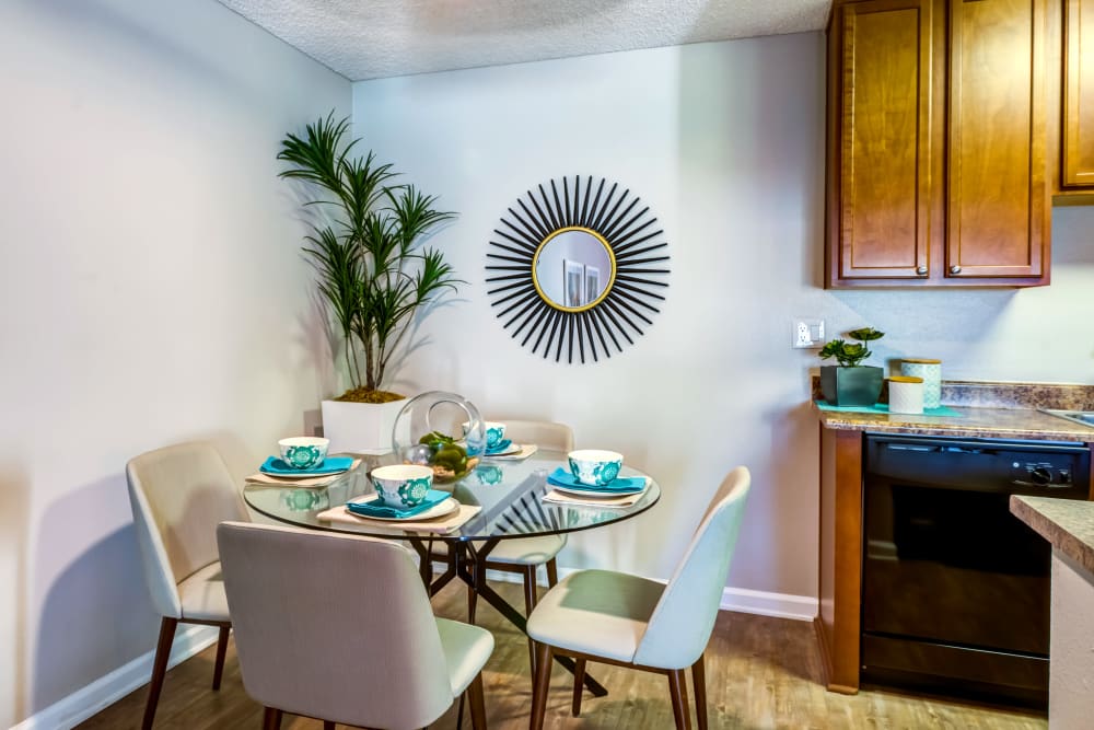 Dining nook next to the modern kitchen in a model home at Sofi Poway in Poway, California