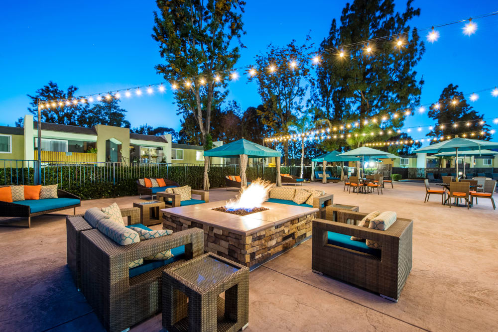 Early evening at the fire pit area surrounded by lounge seating at Sofi Poway in Poway, California