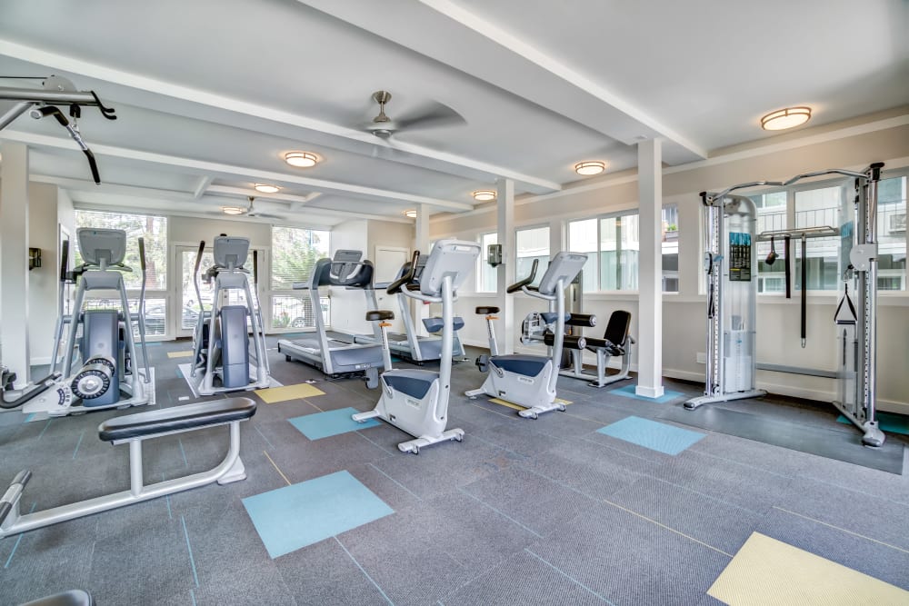 Cardio machines and weight training equipment in the fitness center at Sofi at Los Gatos Creek in San Jose, California