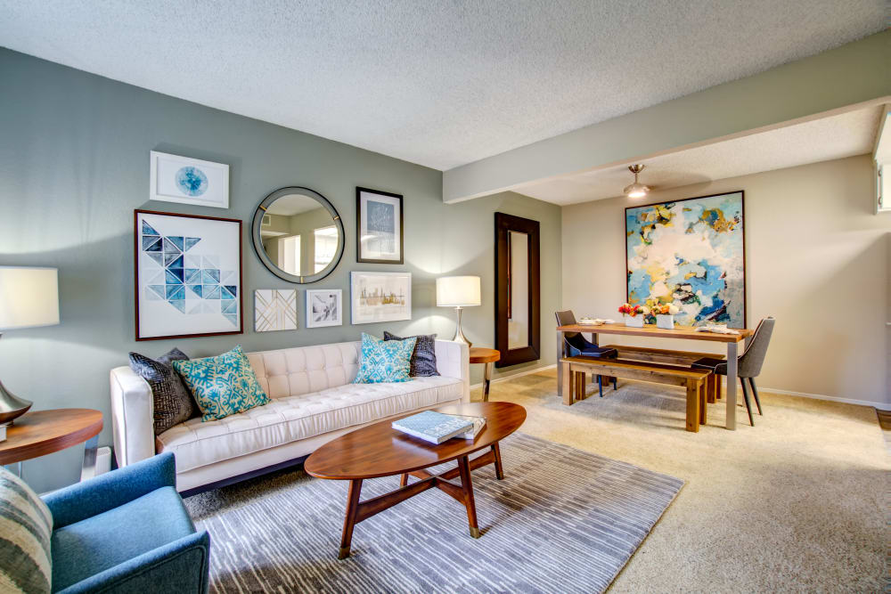 Living area with an accent wall in a model home at Vue Fremont in Fremont, California