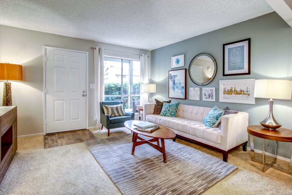Plush carpeting in a well-furnished model home's living area at Vue Fremont in Fremont, California