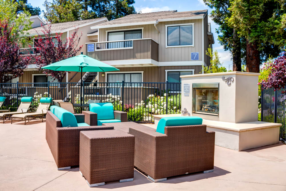 Outdoor lounge with a fire place at Sofi Berryessa in San Jose, California