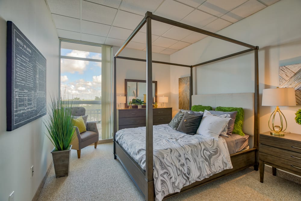 A stylish bedroom at The Peninsula Assisted Living & Memory Care in Hollywood, Florida